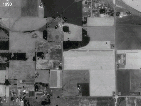 An animated time lapse of landscape change between the years 1990 and 2025. The major change demonstrated is from farmland to data center.