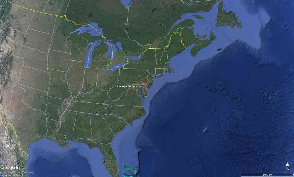 A satellite image of a Chemours company facility at at 201 Discovery Blvd., Newark, DE, USA at 1400 km scale. At this scale a large chunk of the continent of North America and The Atlantic Ocean are visible.
